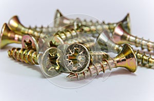 Bunch of yellow zinc coated philips flat head cross screws - fasteners