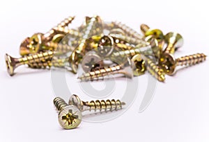Bunch of yellow zinc coated philips flat head cross screws - fasteners photo