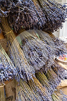 Bunches of aromatic dried lavender flowers for sale in shop in Provence, France