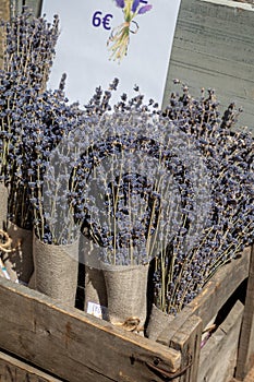 Bunches of aromatic dried lavender or lavandin flowers for sale in shop in Provence, France