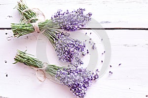 Bunches of fresh purple lavender on white wood