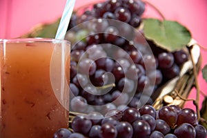 Bunches of grapes and natural fruit juice