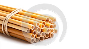 Bundle of Bamboo Straws Tied Together on White Background photo