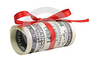 Bundle of bills of one hundred dollars tied with a red ribbon. Dollars isolated on white background