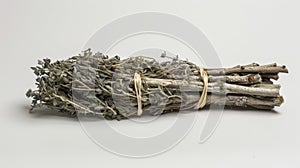 A bundle of dried mugwort leaves often burned in traditional medicine rituals to cleanse and purify the body and spirit