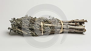 A bundle of dried mugwort leaves often burned in traditional medicine rituals to cleanse and purify the body and spirit photo