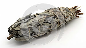 A bundle of dried sage traditionally used in smudging rituals to cleanse the body and mind of negative energy and