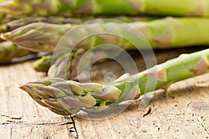Bundle of fresh cut raw, uncooked green asparagus vegetable