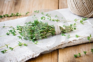 Bundle of fresh thyme on sackcloth