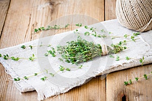 Bundle of fresh thyme on sackcloth