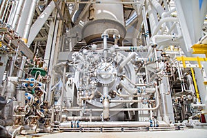 Bundle of gas turbine compressor and turbine engine at offshore oil and gas platform.