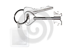 Bundle of keys with blank keychain isolated