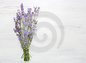 Bundle of lavender on old wooden board painted white