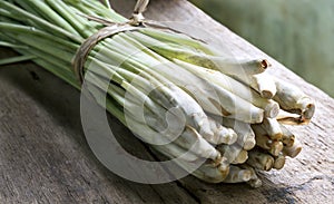 Bundle of Lemon Grass on wood table.