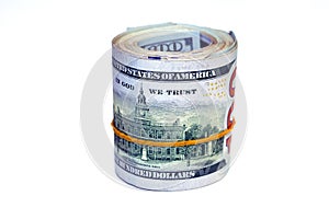 Bundle of money roll of dollars isolated on white background, stack of one hundred dollars American cash money bills rolled up