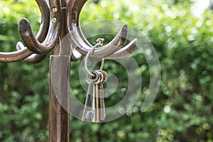 Bundle of old keys on a hanger