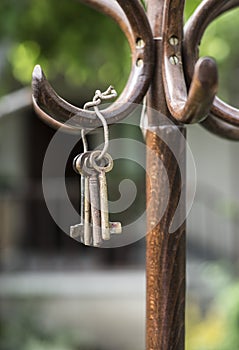 Bundle of old keys on a hanger