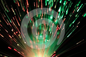 Bundle of optic fibers in red and green light