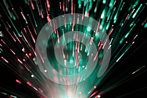 Bundle of optic fibers in red and green light