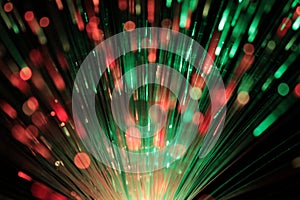 Bundle of optic fibers in red and green light