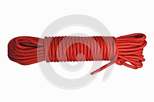 Bundle of red nylon rope on white background