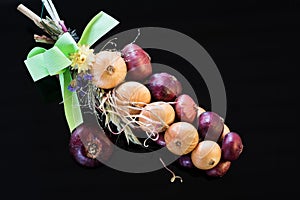 Bundle of red and yellow onion