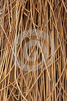 Bundle of rusty bars for reinforcement of concrete photo