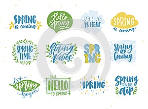 Bundle of spring or springtime phrases or slogans handwritten with calligraphic fonts and decorated by natural seasonal