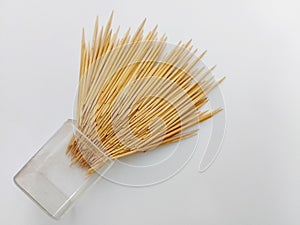 Bundle of Wooden Toothpicks coming out from jar isolated