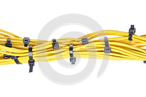 Bundle of yellow cables with black cable ties
