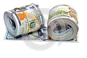 Bundles of money rolls of dollars  on white background, stack of one hundred dollars American cash money bills rolled up
