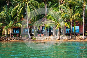 Bungalows on the beach of tropical island