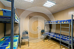 Bunk metal beds in hostel room