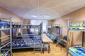 Bunk metal beds in hostel room