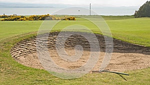 Bunker on golf course by the sea.