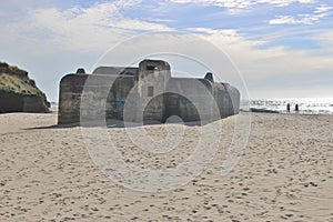 Bunker in the sand: Ruins of an Atlantic Wall Bunker, Denmark, Europe.