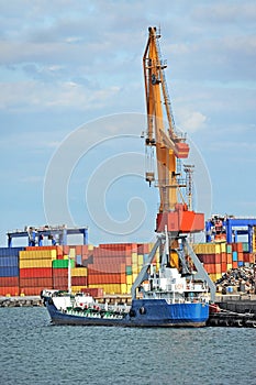 Bunker ship (fuel replenishment tanker) under port crane