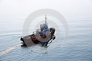 Bunkering of a ship on the open roadstead of the port of Nakhodka, Russia.