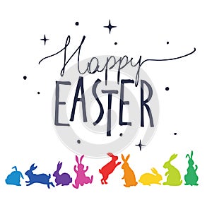 Bunnies silhouettes in rainbow colors arranged in a circle. Happy Easter. photo