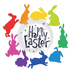Bunnies silhouettes in rainbow colors arranged in a circle. Happy Easter. photo