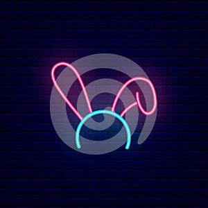 Bunny earss bezel neon icon. Masquerade item. Sex shop sign. Glowing effect banner. Vector stock illustration