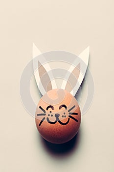 Bunny egg with long ears and whiskers.