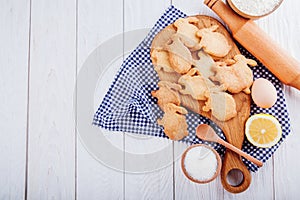 Bunny-shaped cookies with ingredients. Recipe of Easter biscuits