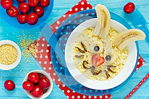 Bunny shaped porridge with fruit for healthy breakfast for kids