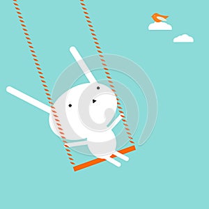 Bunny on a swing