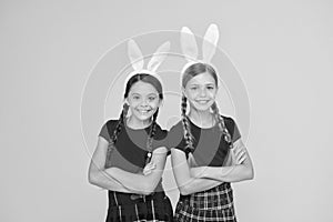 Bunny team. Entertainment and event concept. Spring holidays. Children in rabbit bunny ears. Family and sisterhood