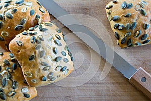 Buns with pumpkin seeds closeup.