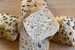 Buns with pumpkin seeds closeup.