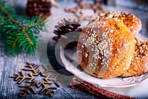 Buns with sesame on plate