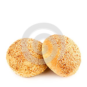Buns with sesame seeds isolated on a white. Free space for text